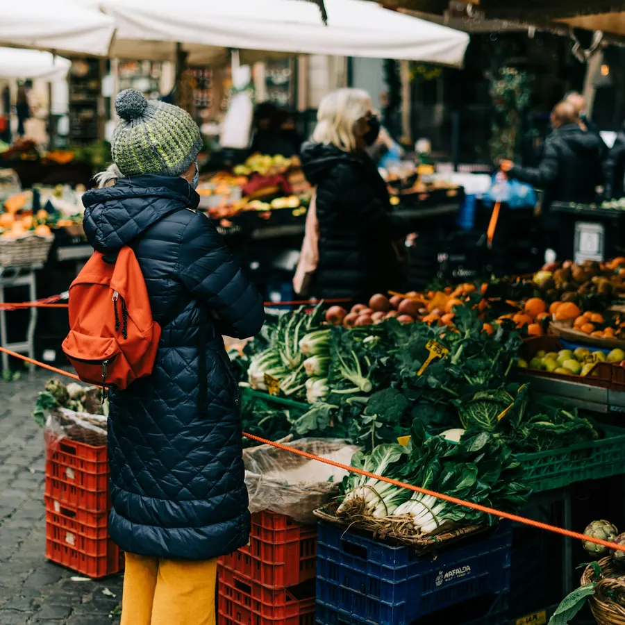A market stall full of fresh vegetables